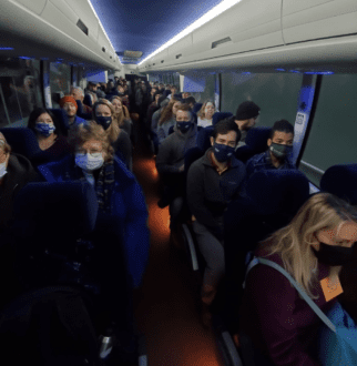 2021 Bus Tour attendees on bus