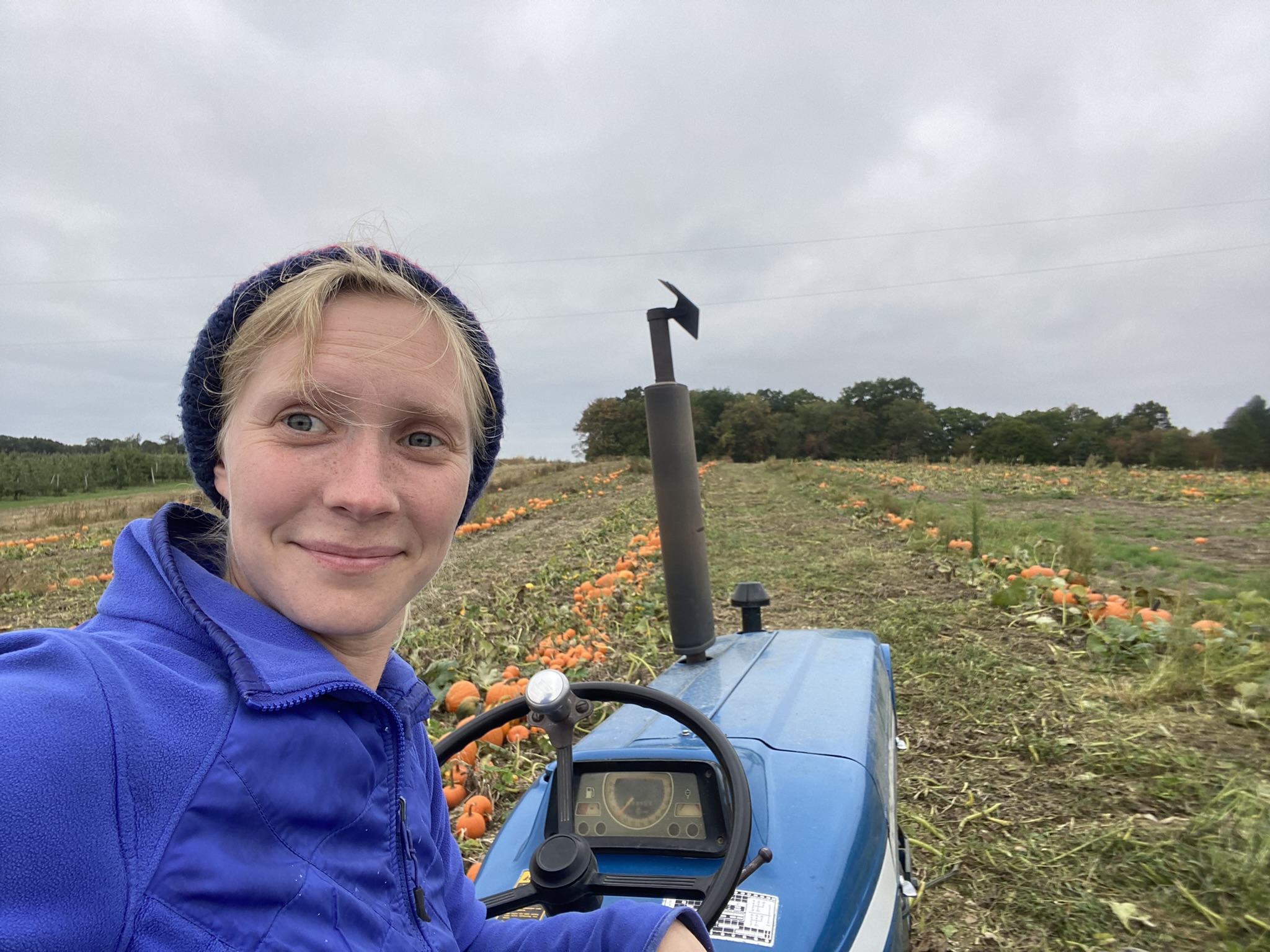 photo of Sara Hricko on tractor