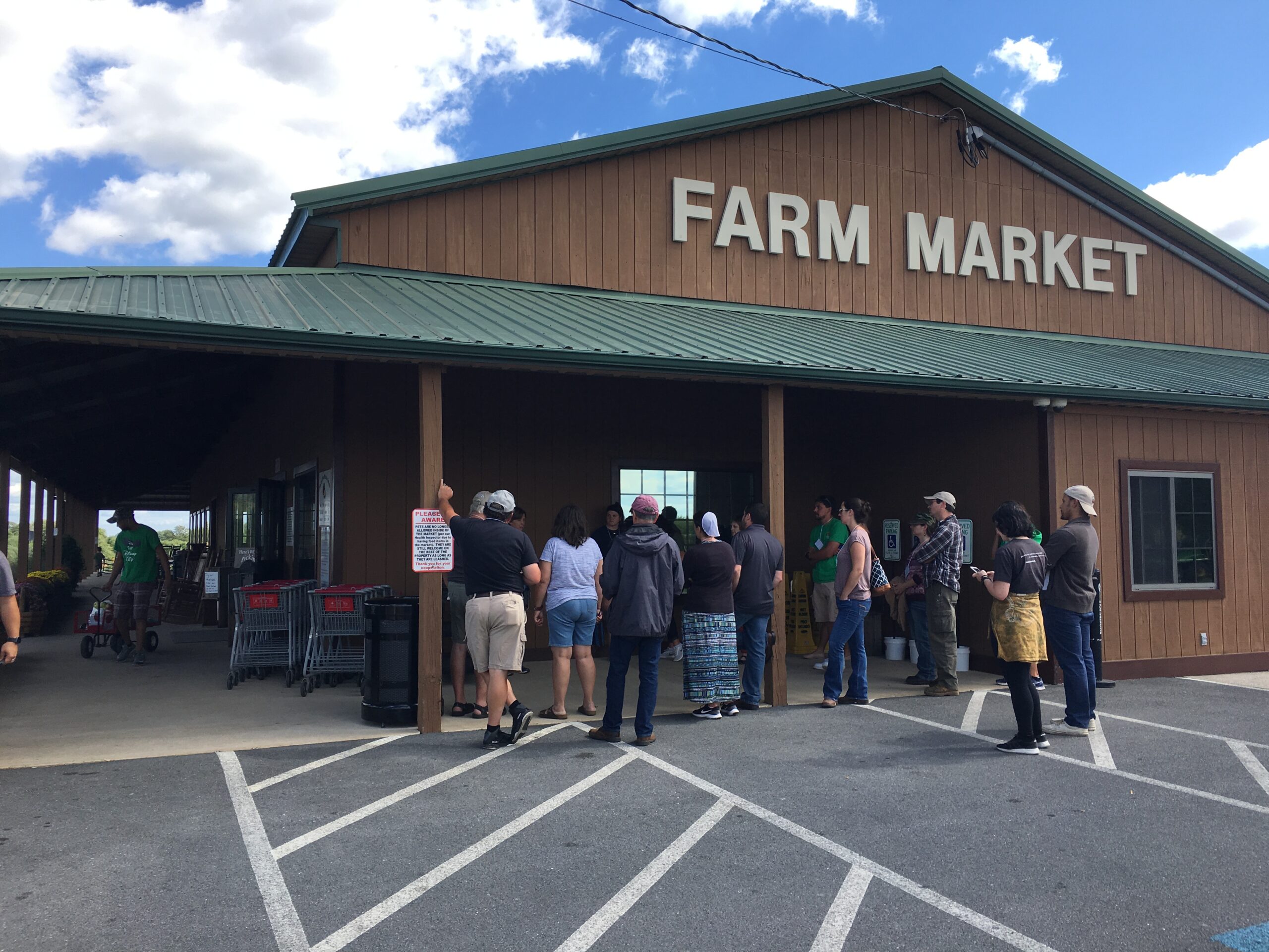 Farm Market exterior with people entering