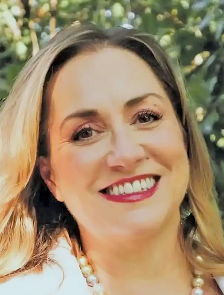 Headshot of Rebeckah Adcock