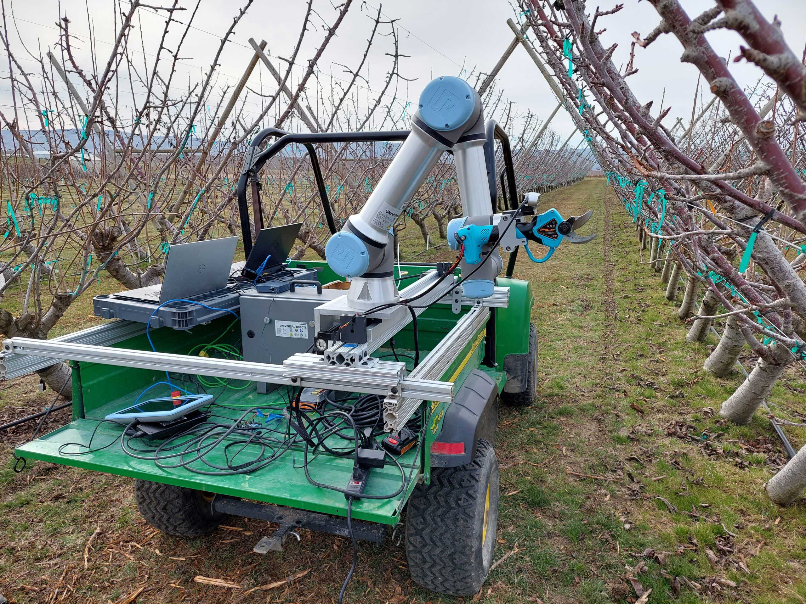 Vehicle with a robotic attachment on the back