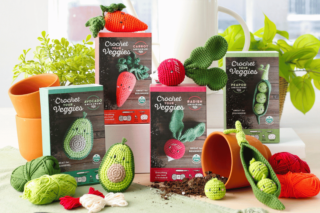 An image of a product line of kits markets can sell, featuring crochet mini vegetables